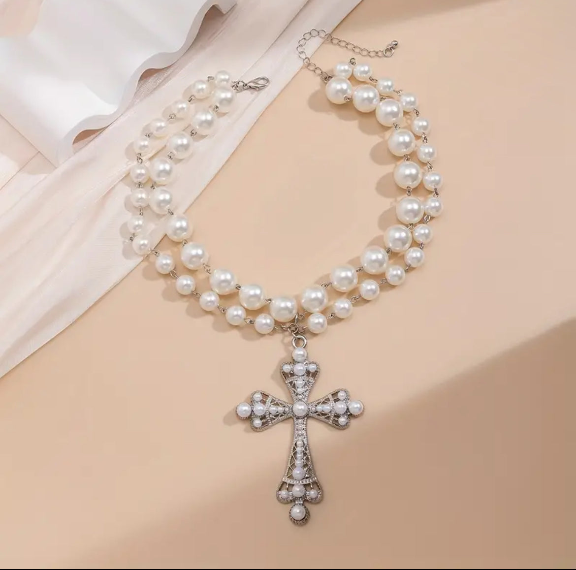 White cross necklace