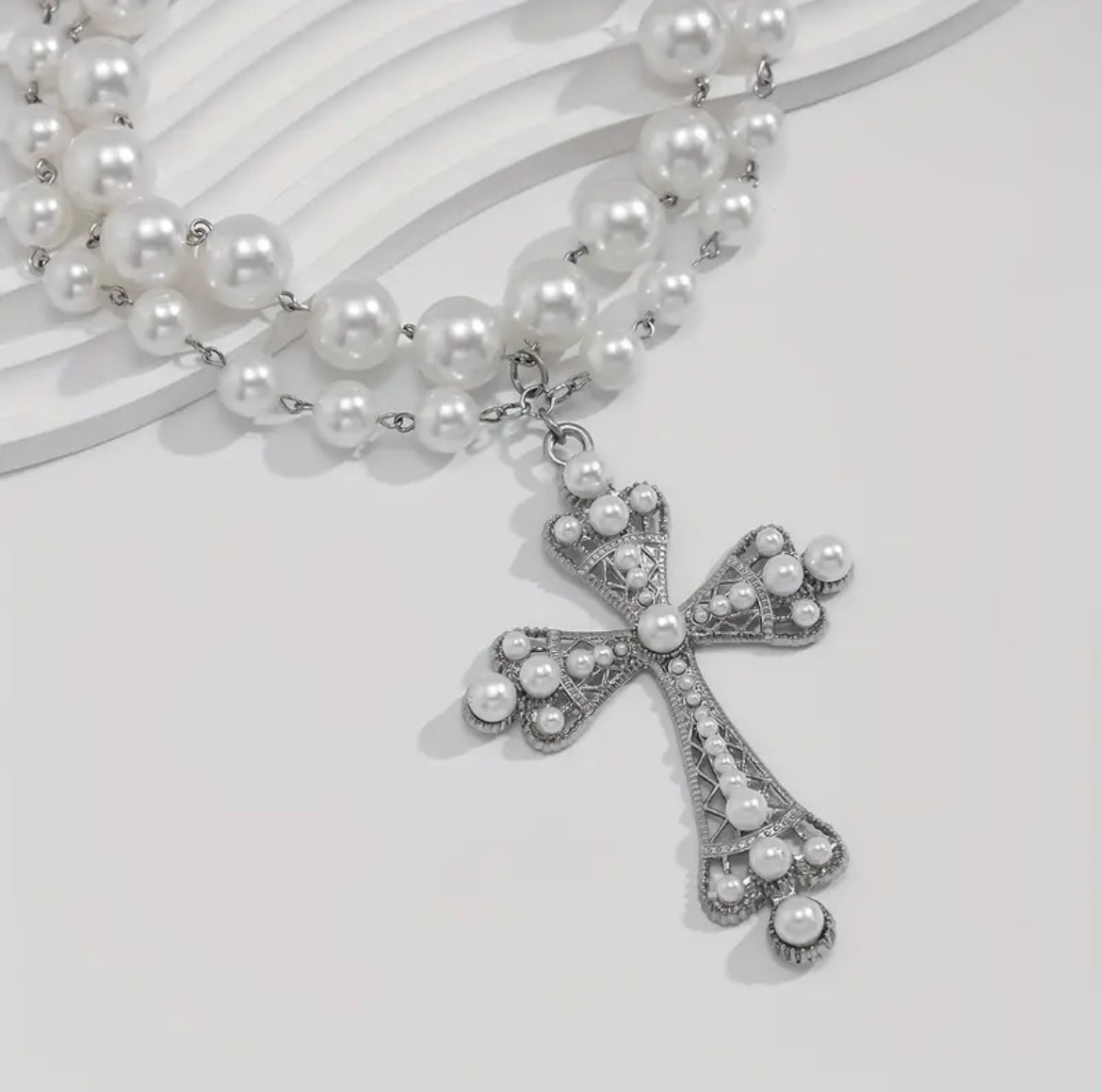 White cross necklace